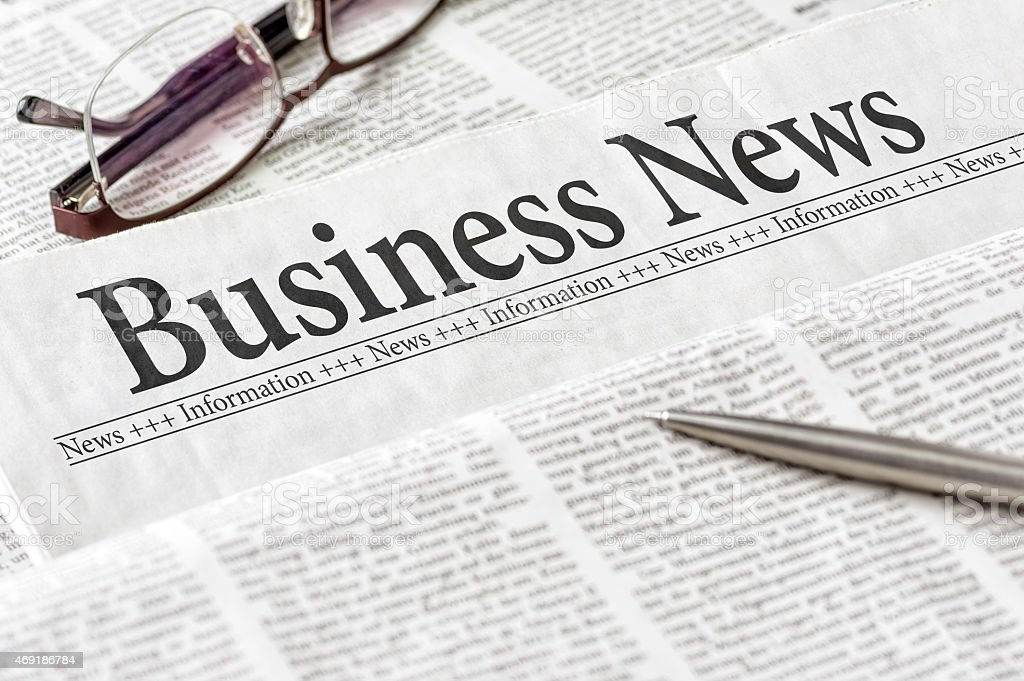 Newspaper With The Headline Business News Stock Photo - Download Image Now - iStock
