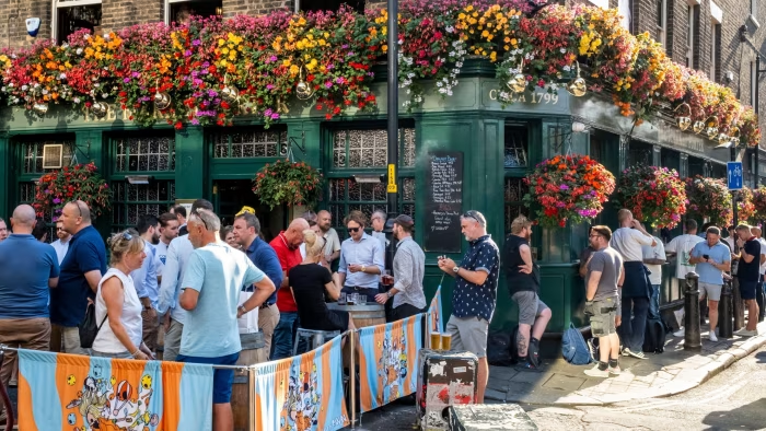 UK services activity falls by less than previously estimated