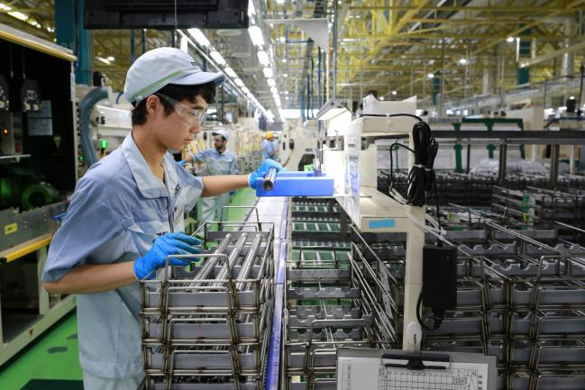 Japan's Manufacturing PMI Rises to Three-Month High By Bloomberg
