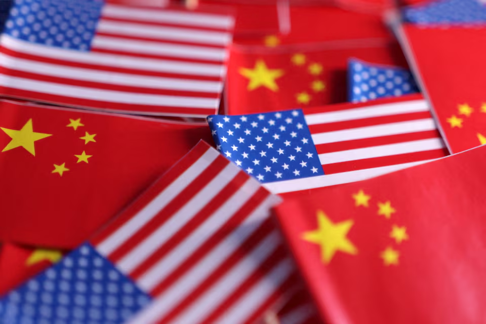 Illustration shows U.S. and Chinese flags